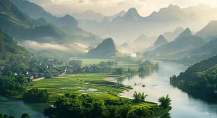 Foto op Canvas a river running through a lush green valley © TTh