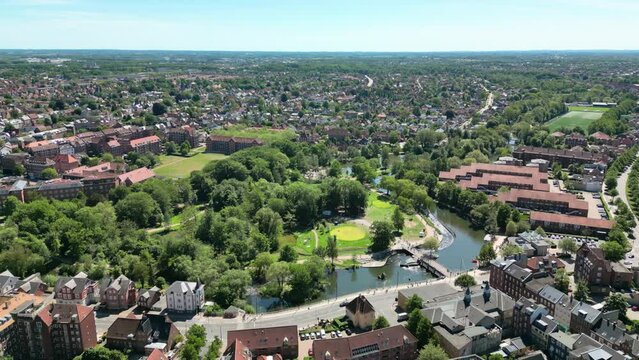 Odense, Denmark: Aerial view of city on island of Funen, summer sunny day with clear blue sky - landscape panorama of Europe from above
