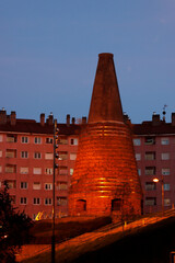 Old factory chimney in a neighborhood of Bilbao