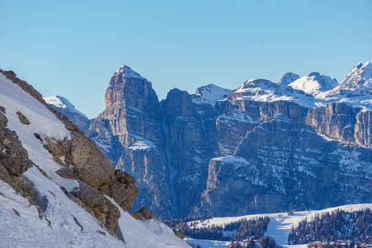 Idyllic view at dolomite mountain landscape during winter with snow covered peaks at pass road of Valparola, South Tirol, Italy