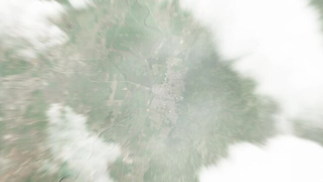 Earth zoom in from space to El Progreso, Honduras. Followed by zoom out through clouds and atmosphere into space. Satellite view. Travel intro. Images from NASA