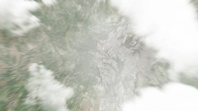 Earth zoom in from space to Mixco, Guatemala. Followed by zoom out through clouds and atmosphere into space. Satellite view. Travel intro. Images from NASA