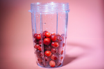 Freshly blended frozen berries in a blender jar.
