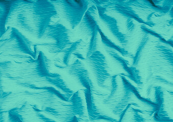 Green cloth pattern close view, textile material background