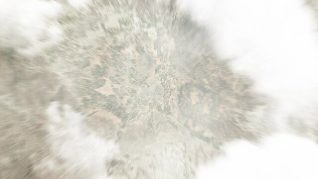 Earth zoom in from space to Sa`dah, Yemen. Followed by zoom out through clouds and atmosphere into space. Satellite view. Travel intro. Images from NASA