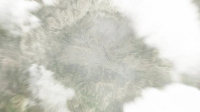 Earth zoom in from space to Ta`izz, Yemen. Followed by zoom out through clouds and atmosphere into space. Satellite view. Travel intro. Images from NASA