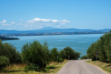 The Trasimeno lake at summer near Torricella and Monte del Lago