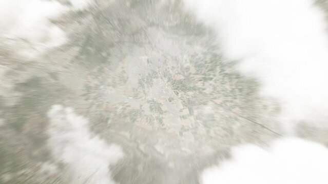 Earth zoom in from space to Qabr as Sitt, Syria. Followed by zoom out through clouds and atmosphere into space. Satellite view. Travel intro. Images from NASA