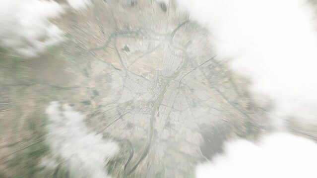Earth zoom in from space to Ahvaz, Iran. Followed by zoom out through clouds and atmosphere into space. Satellite view. Travel intro. Images from NASA