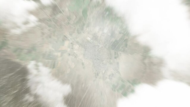Earth zoom in from space to Kaka, Turkmenistan. Followed by zoom out through clouds and atmosphere into space. Satellite view. Travel intro. Images from NASA