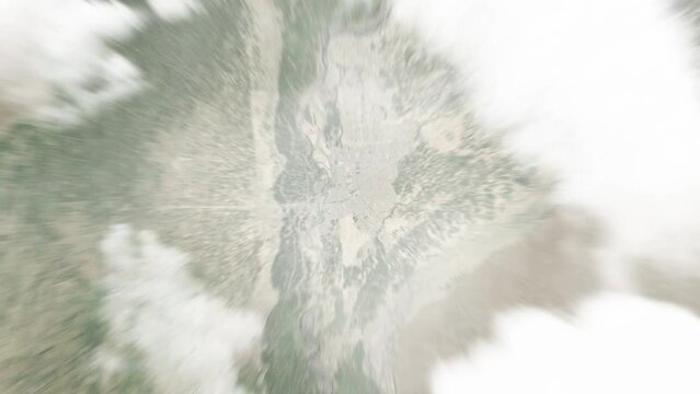 Earth zoom in from space to Lashkar Gah, Afghanistan. Followed by zoom out through clouds and atmosphere into space. Satellite view. Travel intro. Images from NASA