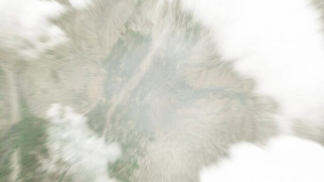 Earth zoom in from space to Kulob, Tajikistan. Followed by zoom out through clouds and atmosphere into space. Satellite view. Travel intro. Images from NASA