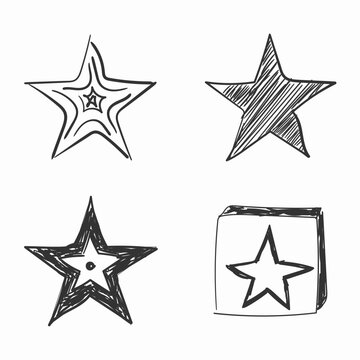 Set of black hand drawn doodle stars on a white background.