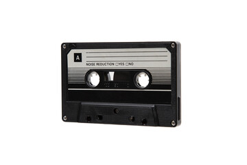 Close-up of an audio cassette with a sticker without text.  Analog storage medium. Cassettes for...
