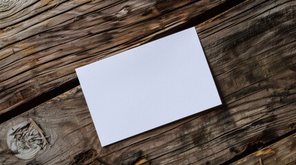 a mockup of a blank white postcard on a wooden table	
 - obrazy, fototapety, plakaty