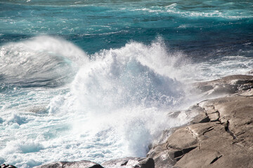 Crashing Waves on the Rocks