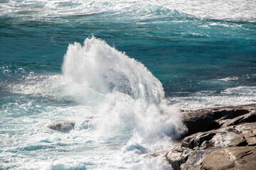 Crashing Waves on the Rocks