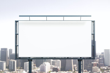 Blank white horizontal billboard on skyline background at daytime, front view. Mock up, advertising concept