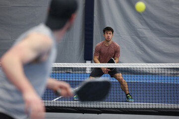 Pickleball singles tournament action