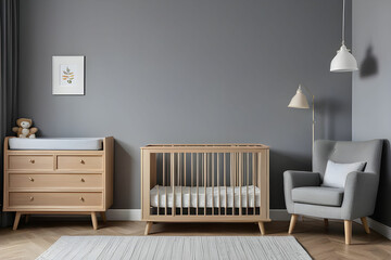 Real photo of a baby crib standing between a low cupboard and an armchair, lamp and stool in child's room interior with wooden floor and grey walls with molding - obrazy, fototapety, plakaty