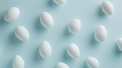 White eggs lay on blue background, minimalism style