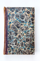 Old Book with Marbled Cover on a white background