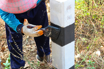 The black-and-white navigation roadside pillars are being repainted to make them more visible....