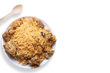 Mutton biryani is a popular Indian dish. Top view of delicious mutton biryani served on white plate on white background.