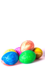 Fototapeta na wymiar Colorful easter eggs on a white background with space for text.