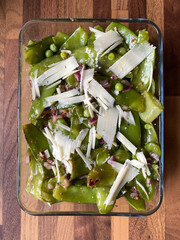 Snow Peas Salad with Parmesan Cheese and Red Onions.