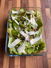 Snow Peas Salad with Parmesan Cheese and Red Onions.