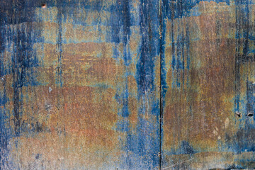 rough dark-blue sun faded flat vertical sheet metal surface with thin rust - full-frame background and texture - obrazy, fototapety, plakaty