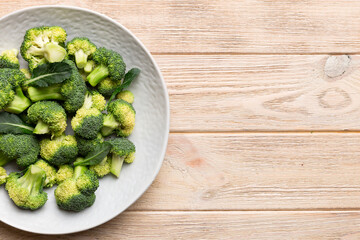 broccoli of fresh green broccoli in bowl over coloredbackground. , close up. Fresh vegetable