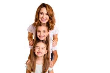 Portrait of three nice cute adorable lovely lovable attractive cheerful positive funny people standing in order of height having fun isolated over bright vivid shine yellow background