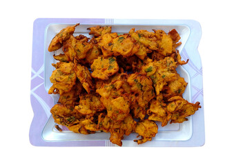 A plate filled with crispy and tasty Pakora - Street Food