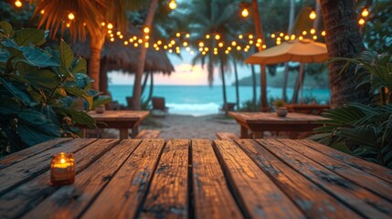  A wooden table with a candle illuminating it, situated on a beach surrounded by palm trees and overhead lights - obrazy, fototapety, plakaty