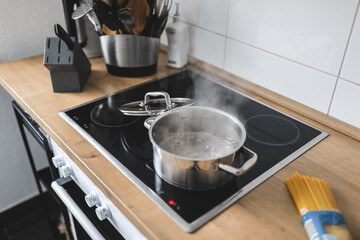 Boiling water in cooking pot - 767049599