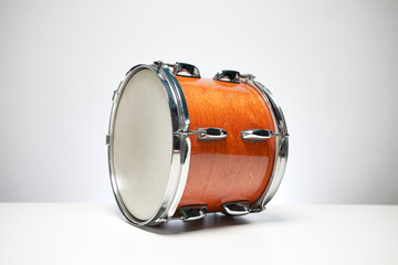 Drum in orange isolated on white background