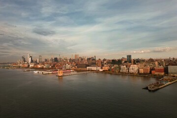 Obraz premium New York skyline from drone. New York Manhattan over the Hudson river. New York cityscape, aerial view. New York downtown skyline with urban skyscrapers.
