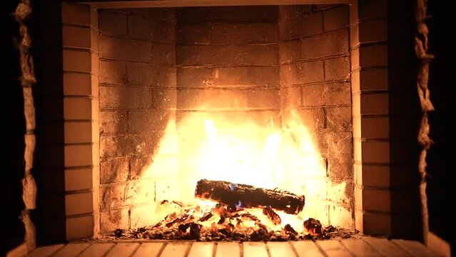 Fireplace. Cozy Relaxing Fireplace. Firewood. Flames of a country house. 