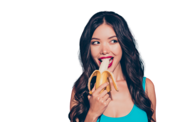 Close-up portrait of nice foxy cunning sweet lovely adorable glamorous delicate charming wavy-haired lady holding biting banana red lips isolated over pink pastel background