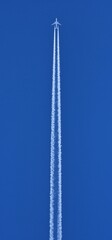 chemtrails denier conspiracist contrail plane reaction contrail condensation on blue background