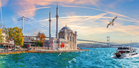 Ship is sailing near the Bosphorus bridge and Ortakoy Mosque, Istanbul, Turkey