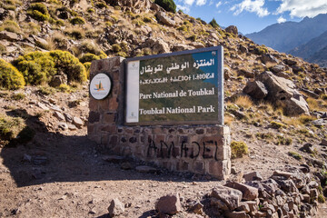 Welcome sign to Toubkal National Park: Exploring the Atlas Mountains of Morocco