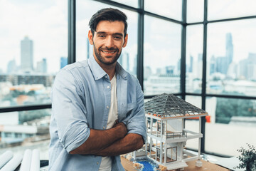 Portrait of architect engineer in casual outfit smile at camera while crossing arms. Businessman...