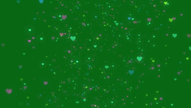 Heart Symbol Floating On Green Screen Background, Valentine Love Romance Background Glowing Glitter Particle, Glitter Heart Particle Love And Romance On Green Screen Background. Abstract Heart Glitter