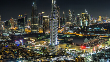 Dubai downtown skyline timelapse at night. Rooftop view of Sheikh Zayed road with numerous...