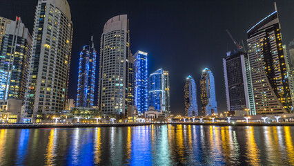 Dubai Marina towers and canal in Dubai night timelapse hyperlapse