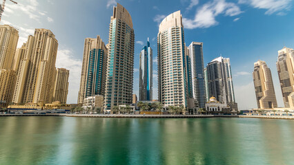 Fototapeta na wymiar Dubai Marina modern towers in Dubai at day time timelapse