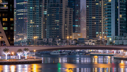 Dubai Marina towers and canal in Dubai night to day timelapse